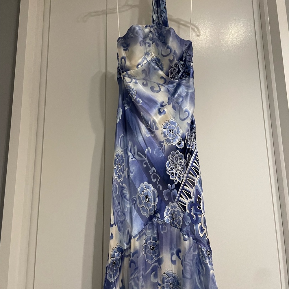 Mary L Couture blue halter Dress in a Size 8. Dress is in great condition.